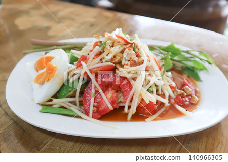 spicy salad, som tam or Thai spicy salad or papaya salad or vegetable salad spicy salad, som tam or Thai spicy salad or papaya salad or vegetable salad 140966305