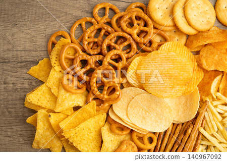 Mix of variety snack chips pretzel and cracker, junk crunchy food. Mix of variety snack chips pretzel and cracker, junk crunchy food. 140967092