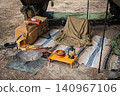 Close-ups of well-used campfire gear with striking details and rugged outdoor cooking equipment. 140967106