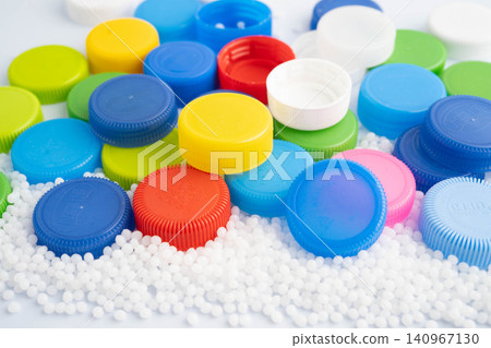 Bangkok, Thailand April 20, 2024 Plastic recycle pellets and caps for industrial use. Bangkok, Thailand April 20, 2024 Plastic recycle pellets and caps for industrial use. 140967130
