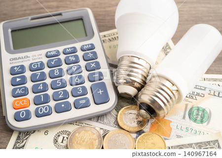 Bangkok, Thailand April 7, 2025 Cost of electric utilities with light bulb for payment. 140967164