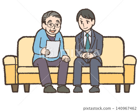一位年長的男士和一位身穿西裝的男士坐在沙發上,一邊看著文件一邊交談。 一位年長的男士和一位身穿西裝的男士坐在沙發上,一邊看著文件一邊交談。 140967462