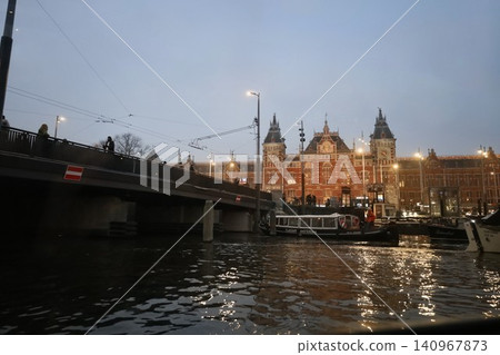 Amsterdam: Central Station and canals as seen from a cruise ship [Netherlands] 140967873