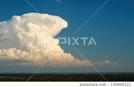 Florida weather. Blue sky with white summer rain clouds. Colorful summer landscape Florida weather. Blue sky with white summer rain clouds. Colorful summer landscape 140968122