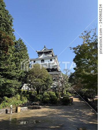 View of the castle tower from the site of the second bailey of Iwakuni Castle. 140968234