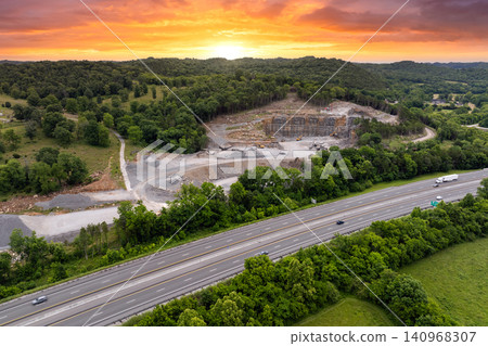 Sand open-pit mining quarry with processing plant for crushed stone. Extracting of natural resources for construction industry Sand open-pit mining quarry with processing plant for crushed stone. Extracting of natural resources for construction industry 140968307