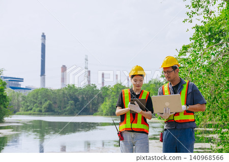 Environment engineer team working survey, inspector industry impact of water river green forest Environment engineer team working survey, inspector industry impact of water river green forest 140968566