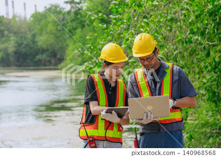 Environment engineer team working survey, inspector industry impact of water river green forest Environment engineer team working survey, inspector industry impact of water river green forest 140968568