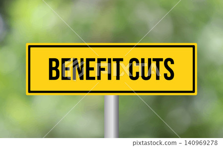 Benefit cuts road sign on blur background Benefit cuts road sign on blur background 140969278