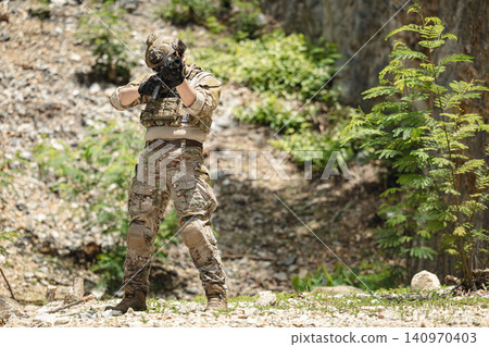 US Special forces soldiers engaged in combat operation, tactical military team in action US Special forces soldiers engaged in combat operation, tactical military team in action 140970403