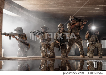 Special forces team advancing in smoke, military combat operation 140970562