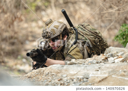 US Army military, Special forces soldier engaged in combat operation, tactical military in action US Army military, Special forces soldier engaged in combat operation, tactical military in action 140970826