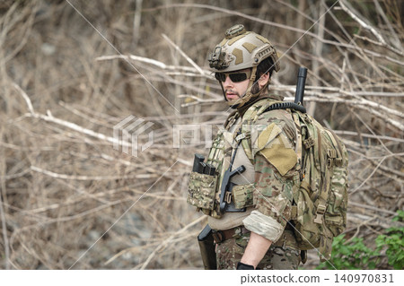 Military special forces soldier team in combat operation, tactical military portrait in action Military special forces soldier team in combat operation, tactical military portrait in action 140970831