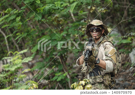 Special forces ranger battle in jungle terrain during border secure military operation Special forces ranger battle in jungle terrain during border secure military operation 140970970