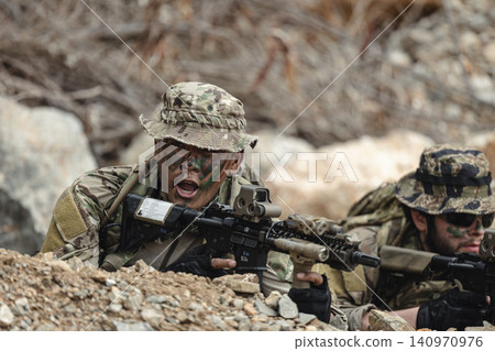 US Marine, Military Special forces soldier under heavy enemy fire intense battlefield engagement 140970976