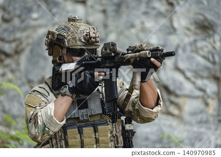 Military special forces soldier team in combat operation, tactical military portrait in action Military special forces soldier team in combat operation, tactical military portrait in action 140970985