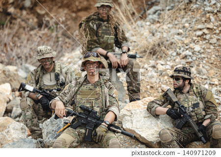 Military special forces soldier team in combat operation, tactical military portrait in action 140971209