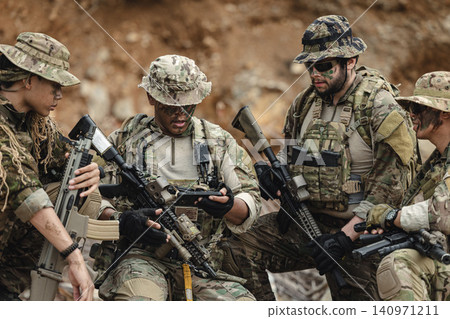 Marine Teamwork meeting, Special forces command team planning tactical operation, Military briefing Marine Teamwork meeting, Special forces command team planning tactical operation, Military briefing 140971211