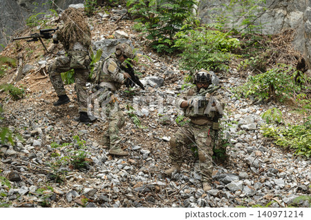 Military rangers, US Marine engaged in jungle combat operation deep in tropical forest Military rangers, US Marine engaged in jungle combat operation deep in tropical forest 140971214