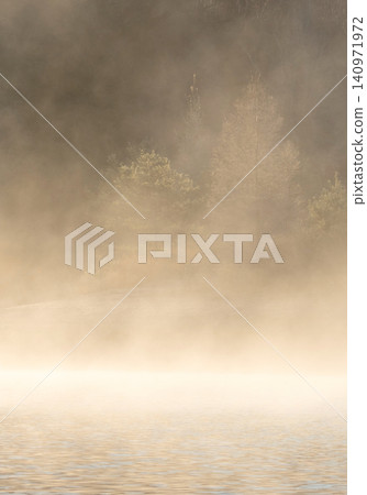 Lake Onbara, its surface shrouded in morning mist. Lake Onbara, its surface shrouded in morning mist. 140971972