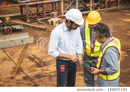 Professional construction Indian engineer teamwork, Builder meeting together talking together. Professional construction Indian engineer teamwork, Builder meeting together talking together. 140972100