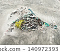 Debris washed ashore: fishing ropes 140972393