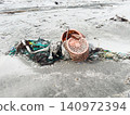 Garbage washed ashore, fishing ropes, baskets, etc. 140972394