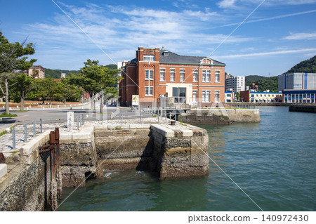 The former Moji Customs House and the Moji Customs House floating pier are located in the Mojiko Retro district of Moji Ward, Kitakyushu City. The former Moji Customs House and the Moji Customs House floating pier are located in the Mojiko Retro district of Moji Ward, Kitakyushu City. 140972430