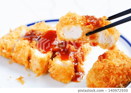 Tonkatsu - Delicious, freshly fried, crispy pork cutlet (pork loin cutlet) Tonkatsu - Delicious, freshly fried, crispy pork cutlet (pork loin cutlet) 140972930