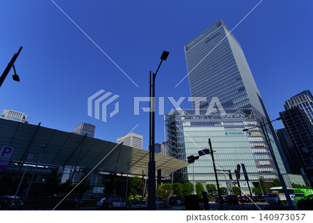 A view of the GranTokyo North Tower and a clear blue sky from the Yaesu Exit of Tokyo Station. A view of the GranTokyo North Tower and a clear blue sky from the Yaesu Exit of Tokyo Station. 140973057
