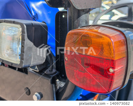 Side View of Tractor Working Light and Turn Signal Side View of Tractor Working Light and Turn Signal 140973082