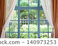 Green garden seen from the window 140973253