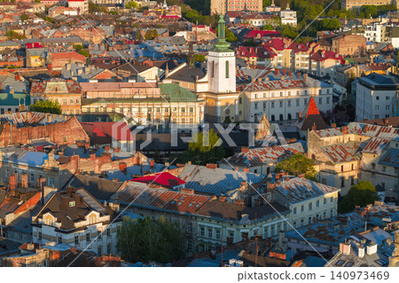 Aerial view of an aged European city undergoing reconstruction and rebuilding efforts Aerial view of an aged European city undergoing reconstruction and rebuilding efforts 140973469