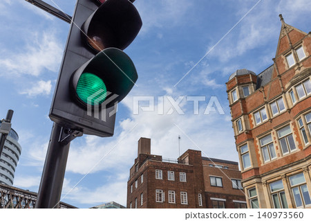 Traffic light showing green signal in London street Traffic light showing green signal in London street 140973560