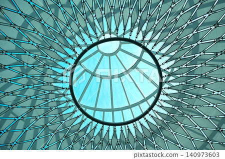 The low angle view of the building ceiling. Interior of modern architecture, modern city building. Interior design. Details of modern architecture. Building abstract. Building background. The low angle view of the building ceiling. Interior of modern architecture, modern city building. Interior design. Details of modern architecture. Building abstract. Building background. 140973603