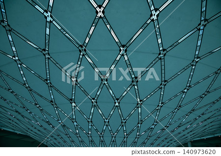 The low angle view of the building ceiling. Interior of modern architecture, modern city building. Interior design. Details of modern architecture. Building abstract. Building background. The low angle view of the building ceiling. Interior of modern architecture, modern city building. Interior design. Details of modern architecture. Building abstract. Building background. 140973620