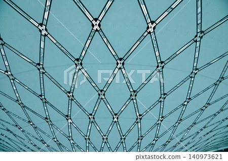 The low angle view of the building ceiling. Interior of modern architecture, modern city building. Interior design. Details of modern architecture. Building abstract. Building background. The low angle view of the building ceiling. Interior of modern architecture, modern city building. Interior design. Details of modern architecture. Building abstract. Building background. 140973621
