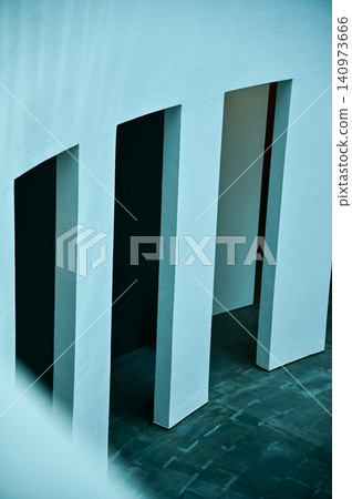 Close-up of the wall, interior of modern architecture, modern city building. Interior design. Details of modern architecture. Building abstract. Building background. Close-up of the wall, interior of modern architecture, modern city building. Interior design. Details of modern architecture. Building abstract. Building background. 140973666