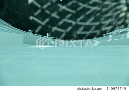 Looking down from the height, close-up of the wall. Interior of contemporary architecture, modern city building. Modern architecture abstract background, building abstract Looking down from the height, close-up of the wall. Interior of contemporary architecture, modern city building. Modern architecture abstract background, building abstract 140973749