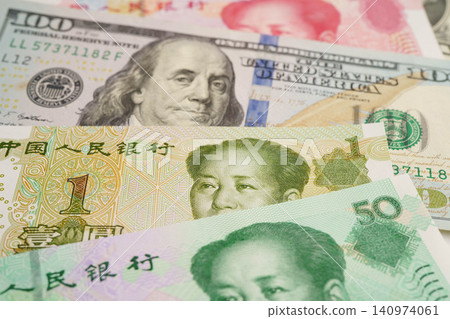 China yuan and dollar banknote money, investment economy business and banking. China yuan and dollar banknote money, investment economy business and banking. 140974061