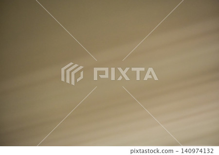 Sun rays on the wall. Soft lines from sun rays on the wall. Abstract background. Light background with sun rays. Soft focus. Gradient pattern from sun rays on the wall. Sun rays on the wall. Soft lines from sun rays on the wall. Abstract background. Light background with sun rays. Soft focus. Gradient pattern from sun rays on the wall. 140974132