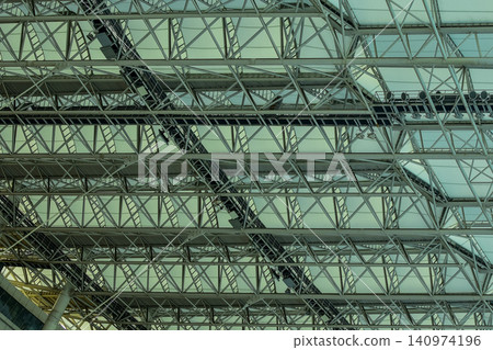 Close-up of the stadium ceiling. Modern architecture, modern city building. Exterior design. Details of modern architecture. Building abstract. Building background. Close-up of the stadium ceiling. Modern architecture, modern city building. Exterior design. Details of modern architecture. Building abstract. Building background. 140974196