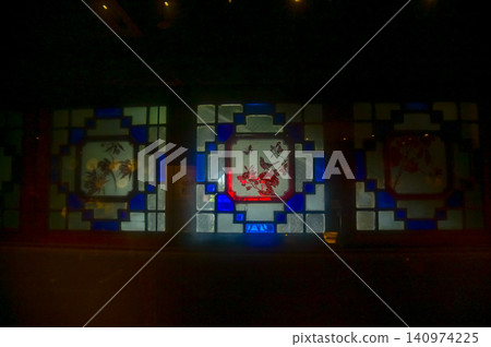 Colorful classic glass window with grid. Colorful abstract stained glass window pattern background. Classic pattern. Building abstract. Building background. Colorful classic glass window with grid. Colorful abstract stained glass window pattern background. Classic pattern. Building abstract. Building background. 140974225