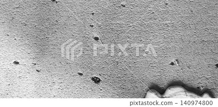 Rough gray concrete surface with white sealant edges Rough gray concrete surface with white sealant edges 140974800
