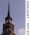 The Palace of Culture and Science in Warsaw, illuminated by the sunset. 140974895