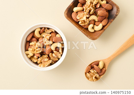 Mixed nuts served in a cocotte Mixed nuts served in a cocotte 140975150