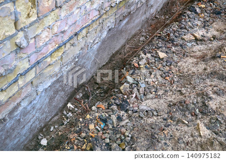 Construction.Preparing foundation for reinforcement by pouring concrete Construction.Preparing foundation for reinforcement by pouring concrete 140975182