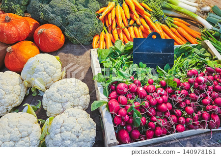 Cauliflower Pumpkins Carrots and Radishes in Rustic Crates Cauliflower Pumpkins Carrots and Radishes in Rustic Crates 140978161