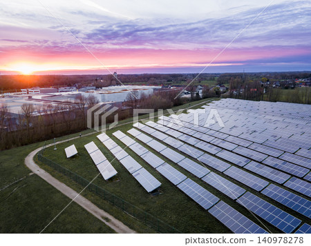 Aerial Solar Field at Dusk Powering Rural Community Aerial Solar Field at Dusk Powering Rural Community 140978278