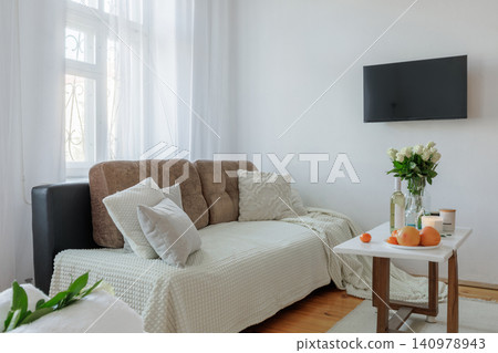 Cozy Living Room Interior with Sofa and Window Staging 140978943